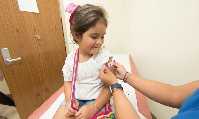 Child receiving a vaccine